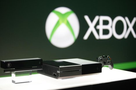 Xbox One (C) with the Kinect motions sensor (L) and the controller is pictured during a press event unveiling Microsoft's new Xbox in Redmon Xbox One (C) with the Kinect motions sensor (L) and the controller is pictured during a press event unveiling Microsoft's new Xbox in Redmon