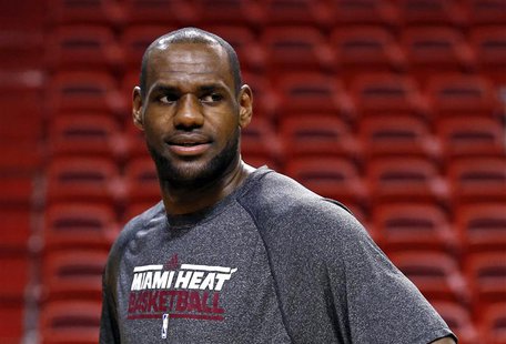 Miami Heat player LeBron James looks on during a team practice ahead of Game 7 of the NBA Finals basketball playoff against the San Antonio Miami Heat player LeBron James looks on during a team practice ahead of Game 7 of the NBA Finals basketball playoff against the San Antonio