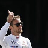 McLaren Formula One driver Jenson Button of Britain gestures before the third practice session of the Monaco F1 Grand Prix May 25, 2013. REU