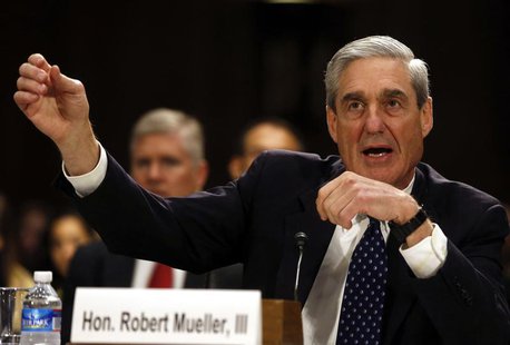 FBI Director Robert Mueller gestures at the U.S. Senate Judiciary Committee at an oversight hearing about the Federal Bureau of Investigatio FBI Director Robert Mueller gestures at the U.S. Senate Judiciary Committee at an oversight hearing about the Federal Bureau of Investigatio