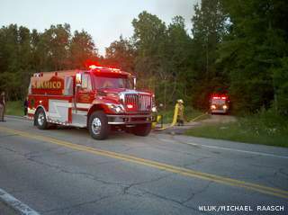 Fire crews respond to a house fire in Suamico on Wednesday June 19, 2013. (courtesy of FOX 11). Fire crews respond to a house fire in Suamico on Wednesday June 19, 2013. (courtesy of FOX 11).