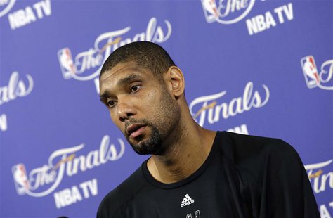 San Antonio Spurs' Tim Duncan speaks to members of the media during a team practice ahead of Game 7 of the NBA Finals basketball playoff aga San Antonio Spurs' Tim Duncan speaks to members of the media during a team practice ahead of Game 7 of the NBA Finals basketball playoff aga