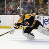 Boston Bruins goalie Tuukka Rask makes a save against the Chicago Blackhawks during the first period in Game 4 of their NHL Stanley Cup Fina
