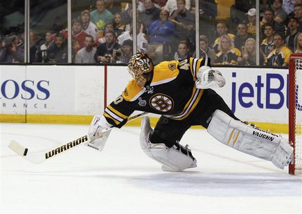 Boston Bruins goalie Tuukka Rask makes a save against the Chicago Blackhawks during the first period in Game 4 of their NHL Stanley Cup Fina Boston Bruins goalie Tuukka Rask makes a save against the Chicago Blackhawks during the first period in Game 4 of their NHL Stanley Cup Fina
