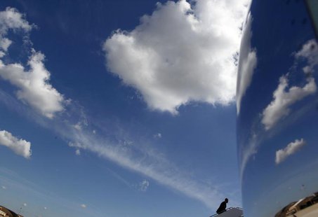President Barack Obama walks up the stairs towards Air Force One at Joint Base Andrews outside Washington before departing for San Francisco President Barack Obama walks up the stairs towards Air Force One at Joint Base Andrews outside Washington before departing for San Francisco