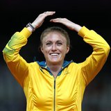 Australia's Sally Pearson reacts on the podium before being presented with the gold medal for the women's 100m hurdles at the London 2012 Ol
