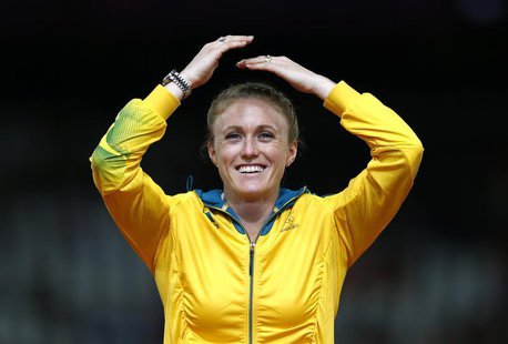 Australia's Sally Pearson reacts on the podium before being presented with the gold medal for the women's 100m hurdles at the London 2012 Ol Australia's Sally Pearson reacts on the podium before being presented with the gold medal for the women's 100m hurdles at the London 2012 Ol