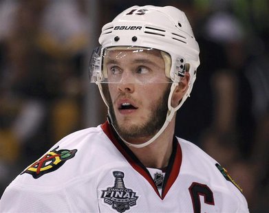 Chicago Blackhawks center Jonathan Toews look out from behind his visor during the second period against the Boston Bruins in Game 4 of thei Chicago Blackhawks center Jonathan Toews look out from behind his visor during the second period against the Boston Bruins in Game 4 of thei