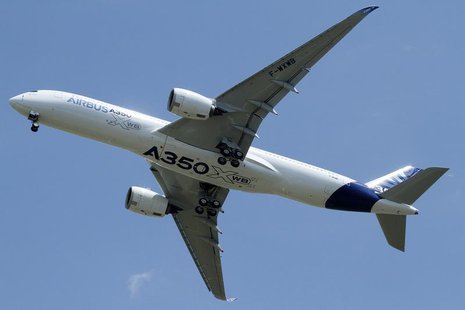 The new Airbus A350 flies over Toulouse-Blagnac airport during its maiden flight in southwestern France, June 14, 2013. REUTERS/Jean-Philipp The new Airbus A350 flies over Toulouse-Blagnac airport during its maiden flight in southwestern France, June 14, 2013. REUTERS/Jean-Philipp