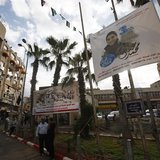 A banner depicting Mohammed Assaf, a contestant in the TV talent show 'Arab Idol', hangs from poles in the West Bank city of Ramallah May 13 A banner depicting Mohammed Assaf, a contestant in the TV talent show 'Arab Idol', hangs from poles in the West Bank city of Ramallah May 13