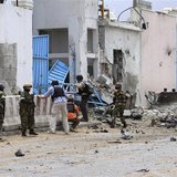 Security agents arrive to secure the United Nations compound following a suicide bomb attack in the capital Mogadishu, June 19, 2013. REUTER