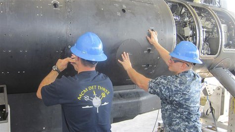 Mine Counter Measures Mission Detachment sailors prepare the Remote Multi-Mission Vehicle (RMMV) during reliability testing near Palm Beach, Mine Counter Measures Mission Detachment sailors prepare the Remote Multi-Mission Vehicle (RMMV) during reliability testing near Palm Beach,