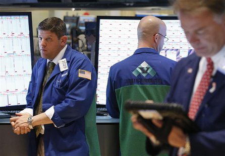 Traders work on the floor at the New York Stock Exchange, June 20, 2013. REUTERS/Brendan McDermid Traders work on the floor at the New York Stock Exchange, June 20, 2013. REUTERS/Brendan McDermid