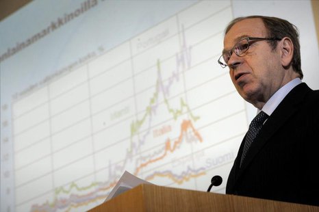 Bank of Finland Governor Erkki Liikanen speaks during a press briefing on the release of the latest issue of the Euro & talous (Euro and Eco Bank of Finland Governor Erkki Liikanen speaks during a press briefing on the release of the latest issue of the Euro & talous (Euro and Eco