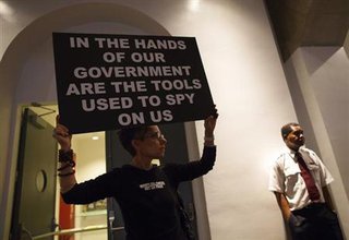 A woman holds up a sign at a support rally for Edward Snowden, a former contractor at the National Security Agency (NSA), in New York June 19, 2013.
Credit: Reuters/Eric Thayer