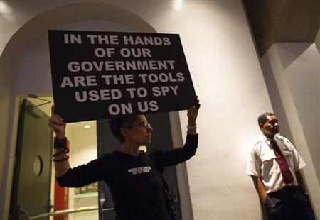 A woman holds up a sign at a support rally for Edward Snowden, a former contractor at the National Security Agency (NSA), in New York June 19, 2013.
Credit: Reuters/Eric Thayer A woman holds up a sign at a support rally for Edward Snowden, a former contractor at the National Security Agency (NSA), in New York June 19, 2013.
Credit: Reuters/Eric Thayer