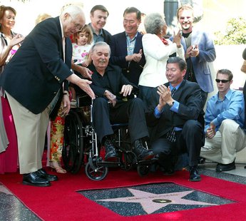 James Doohan, (C) who played "Scotty" in the 1960's TV series 'Star Trek,' receives his star on the famous Hollywood Walk of Fame as fans, f James Doohan, (C) who played "Scotty" in the 1960's TV series 'Star Trek,' receives his star on the famous Hollywood Walk of Fame as fans, f