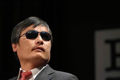 Chinese dissident Chen Guangcheng speaks to journalists following an appearance in New York May 3, 2013. REUTERS/Brendan McDermid Chinese dissident Chen Guangcheng speaks to journalists following an appearance in New York May 3, 2013. REUTERS/Brendan McDermid