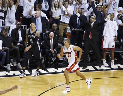 Miami Heat's Shane Battier (31) reacts after hitting a three point basket over San Antonio Spurs' Danny Green during the fourth quarter in G Miami Heat's Shane Battier (31) reacts after hitting a three point basket over San Antonio Spurs' Danny Green during the fourth quarter in G