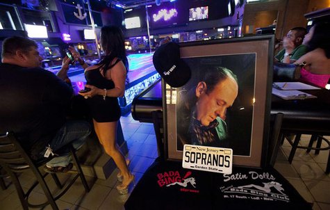 Employees and customers congregate at the bar of Satin Dolls, which stood in as the Bada Bing Club filmed in the TV show "The Sopranos", in Employees and customers congregate at the bar of Satin Dolls, which stood in as the Bada Bing Club filmed in the TV show "The Sopranos", in
