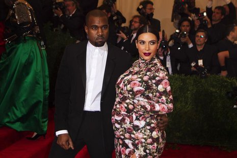 Singer Kanye West and reality television actress Kim Kardashian arrive at the Metropolitan Museum of Art Costume Institute Benefit celebrati Singer Kanye West and reality television actress Kim Kardashian arrive at the Metropolitan Museum of Art Costume Institute Benefit celebrati