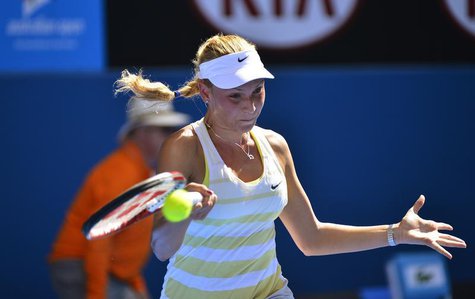Donna Vekic of Croatia hits a return to Caroline Wozniacki of Denmark during their women's singles match at the Australian Open tennis tourn Donna Vekic of Croatia hits a return to Caroline Wozniacki of Denmark during their women's singles match at the Australian Open tennis tourn