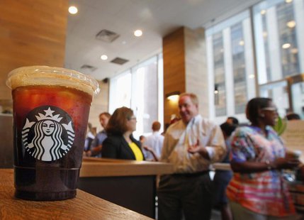 An iced coffee sits on a counter in a Starbucks outlet in New York July 25, 2012. REUTERS/Brendan McDermid An iced coffee sits on a counter in a Starbucks outlet in New York July 25, 2012. REUTERS/Brendan McDermid