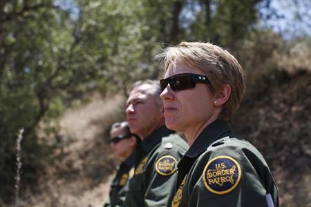 Border Patrol Agents watch their specialized unit, Border Patrol's Search, Trauma, and Rescue (BORSTAR) team as they demonstrate a technical rescue extraction of a patient off the side of a cliff in Pena Blanca Canyon, Arizona May 21, 2013.
REUTERS/Samantha Sais Border Patrol Agents watch their specialized unit, Border Patrol's Search, Trauma, and Rescue (BORSTAR) team as they demonstrate a technical rescue extraction of a patient off the side of a cliff in Pena Blanca Canyon, Arizona May 21, 2013.
REUTERS/Samantha Sais