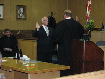 Supreme Court Judge Michael Gableman administers the oath and investiture to new Marathon County Judge Lamont K. Jacobson Supreme Court Judge Michael Gableman administers the oath and investiture to new Marathon County Judge Lamont K. Jacobson