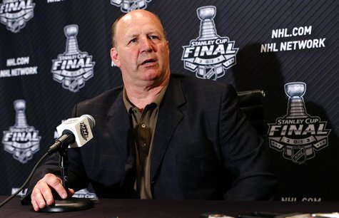 Boston Bruins head coach Claude Julien answers a question from a reporter in Chicago, Illinois, June 21, 2013, ahead of Game 5 of his teams Boston Bruins head coach Claude Julien answers a question from a reporter in Chicago, Illinois, June 21, 2013, ahead of Game 5 of his teams