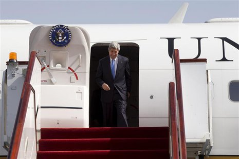 U.S. Secretary of State John Kerry disembarks from his plane as he arrives in Doha, June 22, 2013. REUTERS/Jacquelyn Martin/Pool U.S. Secretary of State John Kerry disembarks from his plane as he arrives in Doha, June 22, 2013. REUTERS/Jacquelyn Martin/Pool