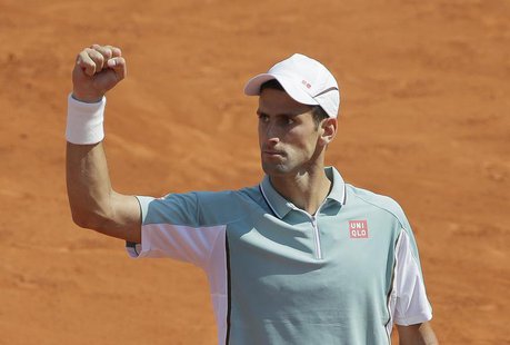 Novak Djokovic of Serbia reacts during his men's singles semi-final match against Rafael Nadal of Spain at the French Open tennis tournament Novak Djokovic of Serbia reacts during his men's singles semi-final match against Rafael Nadal of Spain at the French Open tennis tournament