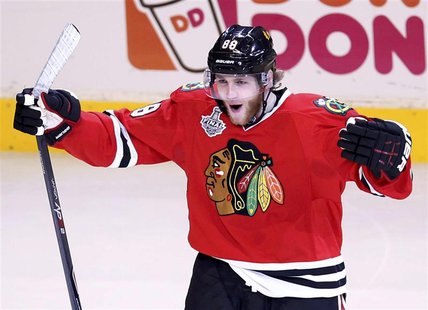 Chicago Blackhawks' Patrick Kane celebrates his goal on the Boston Bruins during the first period in Game 5 of their NHL Stanley Cup Finals Chicago Blackhawks' Patrick Kane celebrates his goal on the Boston Bruins during the first period in Game 5 of their NHL Stanley Cup Finals