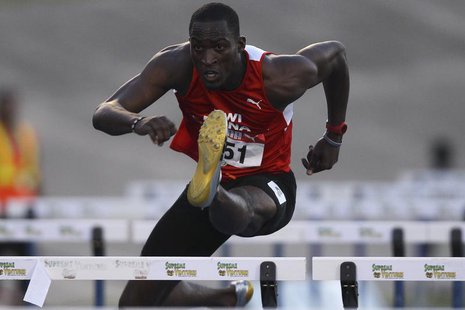 Hansle Parchment runs during the men's 110 meters hurdles semi finals at the Jamaican Olympic trials in Kingston city, June 30, 2012. REUTER Hansle Parchment runs during the men's 110 meters hurdles semi finals at the Jamaican Olympic trials in Kingston city, June 30, 2012. REUTER