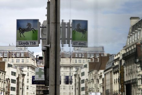 A sign from a branch of a Lloyds bank is reflected in a window in central London May 13, 2013. REUTERS/Stefan Wermuth A sign from a branch of a Lloyds bank is reflected in a window in central London May 13, 2013. REUTERS/Stefan Wermuth
