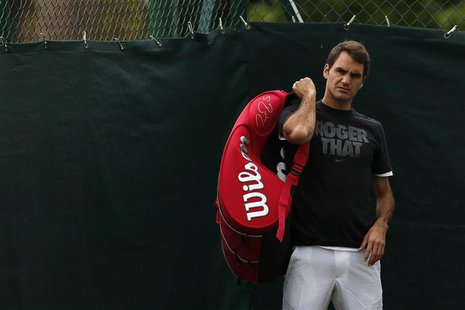 Roger Federer of Switzerland leaves a practice after a training session before the start of the Wimbledon Tennis Championships in London Jun Roger Federer of Switzerland leaves a practice after a training session before the start of the Wimbledon Tennis Championships in London Jun
