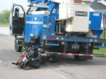 The rider of the Motorcycle was thrown to the pavement by the collision. The driver of the truck was not hurt. The rider of the Motorcycle was thrown to the pavement by the collision. The driver of the truck was not hurt.