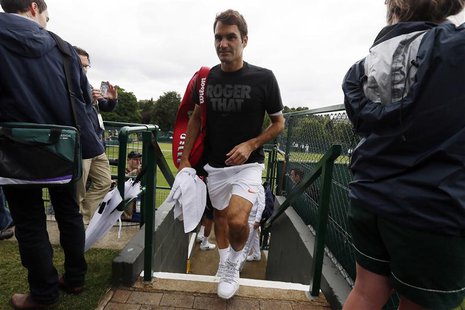 Roger Federer of Switzerland leaves a practice after a training session before the start of the Wimbledon Tennis Championships in London Jun Roger Federer of Switzerland leaves a practice after a training session before the start of the Wimbledon Tennis Championships in London Jun