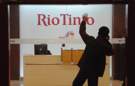 A man waits to enter the Rio Tinto Limited Shanghai Representative Office in Shanghai March 18, 2010. REUTERS/Stringer A man waits to enter the Rio Tinto Limited Shanghai Representative Office in Shanghai March 18, 2010. REUTERS/Stringer