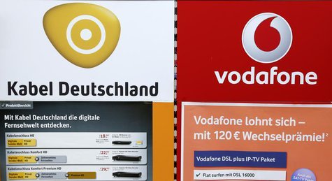 An advertising billboard of Germany's biggest cable operator Kabel Deutschland and mobile operator Vodafone is pictured in a shop in Berlin An advertising billboard of Germany's biggest cable operator Kabel Deutschland and mobile operator Vodafone is pictured in a shop in Berlin