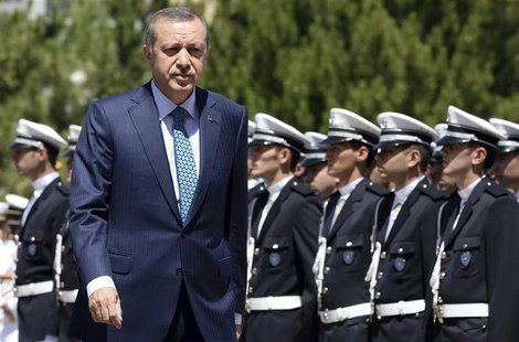 Turkey's Prime Minister Tayyip Erdogan reviews students of the Police Academy upon his arrival to their graduation ceremony in Ankara June 2 Turkey's Prime Minister Tayyip Erdogan reviews students of the Police Academy upon his arrival to their graduation ceremony in Ankara June 2