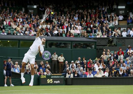 Roger Federer of Switzerland serves to Victor Hanescu of Romania in their men's singles tennis match at the Wimbledon Tennis Championships, Roger Federer of Switzerland serves to Victor Hanescu of Romania in their men's singles tennis match at the Wimbledon Tennis Championships,