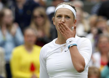 Victoria Azarenka of Belarus blows a kiss after defeating Maria Joao Koehler of Portugal in their women's singles tennis match at the Wimble Victoria Azarenka of Belarus blows a kiss after defeating Maria Joao Koehler of Portugal in their women's singles tennis match at the Wimble