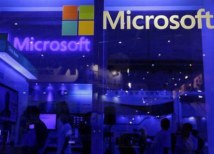 People visit the Microsoft booth at the 2013 Computex exhibition at the TWTC Nangang exhibition hall in Taipei June 4, 2013. REUTERS/Pichi C People visit the Microsoft booth at the 2013 Computex exhibition at the TWTC Nangang exhibition hall in Taipei June 4, 2013. REUTERS/Pichi C