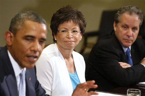 Senior Advisor Valerie Jarrett (C) listens to U.S. President Barack Obama as he meets business leaders to discuss the need for commonsense i Senior Advisor Valerie Jarrett (C) listens to U.S. President Barack Obama as he meets business leaders to discuss the need for commonsense i