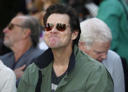 Actor Jim Carrey attends a hand and footprint ceremony for actress Jane Fonda in the forecourt of the Chinese theatre in Hollywood, Californ Actor Jim Carrey attends a hand and footprint ceremony for actress Jane Fonda in the forecourt of the Chinese theatre in Hollywood, Californ