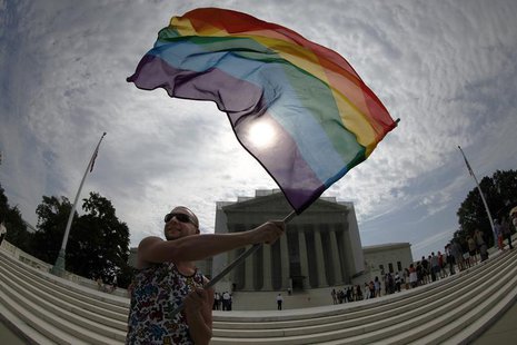 Gay marriage supporter Vin Testa waves a rainbow flag in anticipation of U.S. Supreme Court rulings in the cases against California's gay ma Gay marriage supporter Vin Testa waves a rainbow flag in anticipation of U.S. Supreme Court rulings in the cases against California's gay ma