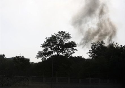 Smoke rises from the site of an attack in Kabul June 25, 2013. REUTERS/Mohammad Ismail Smoke rises from the site of an attack in Kabul June 25, 2013. REUTERS/Mohammad Ismail