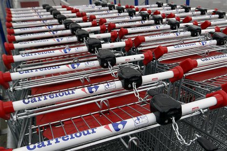 View of shopping trolleys on a parking lot at the Carrefour hypermarket in Rosny sous Bois, east of Paris, April 30, 2013. REUTERS/Charles P View of shopping trolleys on a parking lot at the Carrefour hypermarket in Rosny sous Bois, east of Paris, April 30, 2013. REUTERS/Charles P