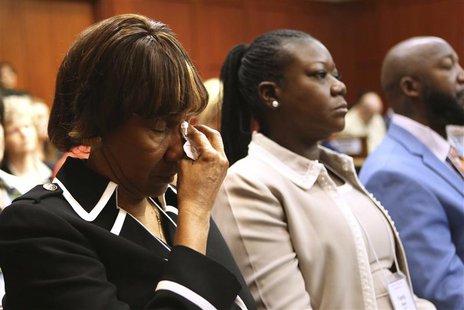 Marion Evans (L), the grandmother of Trayvon Martin, and mother of Trayvon Martin Sybrina Fulton (R), react as they listen to the descriptio Marion Evans (L), the grandmother of Trayvon Martin, and mother of Trayvon Martin Sybrina Fulton (R), react as they listen to the descriptio